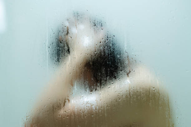 istock Woman enjoy taking a bath and shower. 1393631891