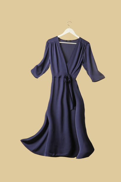 istock Studio shot of floating blue wrapped dress 1393633174