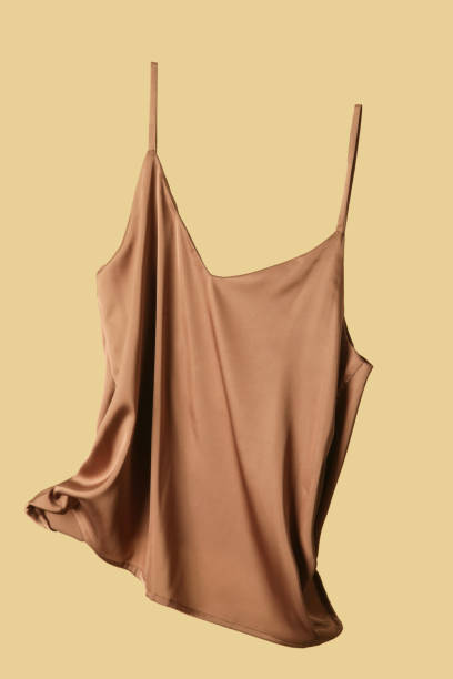 istock Studio shot of floating silk camisole shirt 1393634869