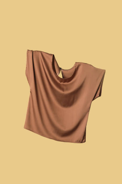 Studio shot of floating simple wide blouse