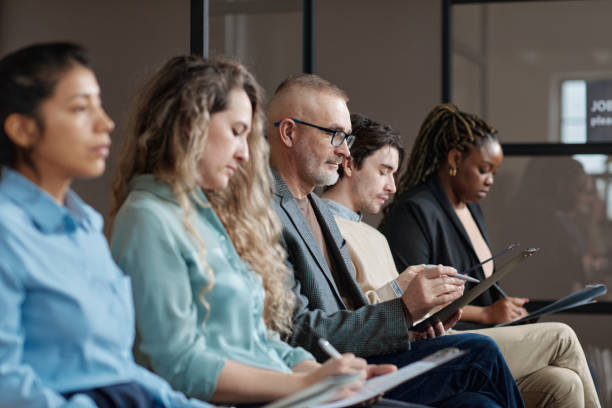 istock Group of candidates coming to job interview 1393635743