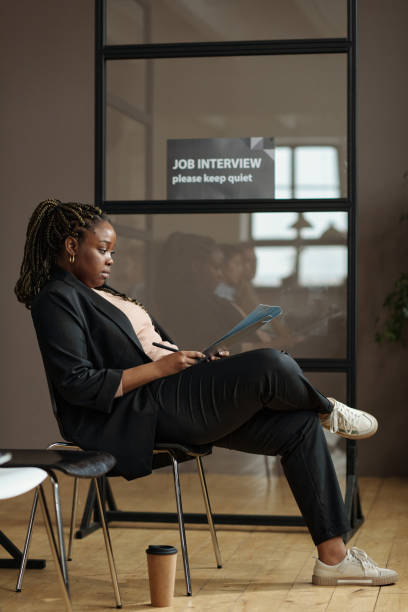 istock Candidate filling resume form for job interview 1393635776