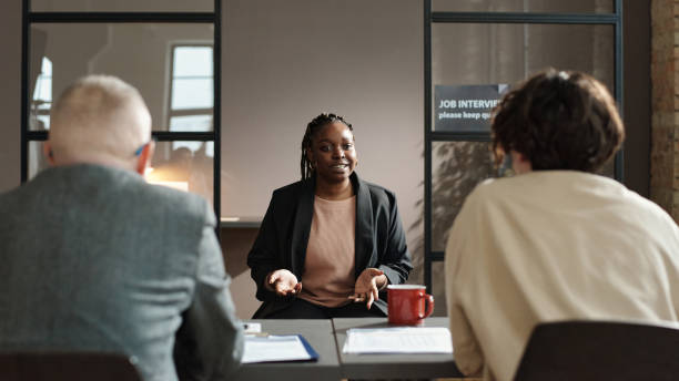 istock Woman talking to employers at interview 1393636282