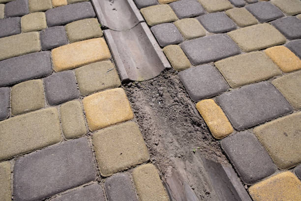 istock Broken paving slabs. Poor quality resulting in spillage 1393637636