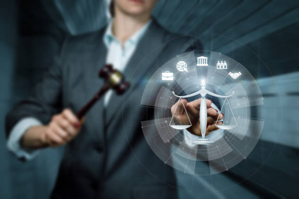 istock Lawier clicks on Scales of Justice . 1393639977