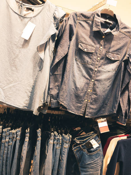 istock denim jeans and shirts in clothe store 1393640210
