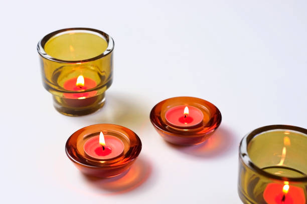 istock Red scented candles for daily meditation. 1393641383