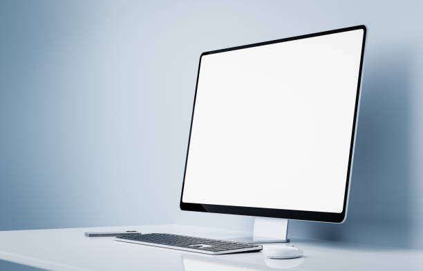 istock Computer all-in-one with a blank screen front in industrial loft office interior 1393644822