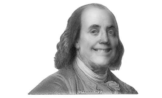 Benjamin Franklin cut on new 100 dollars banknote isolated on white background