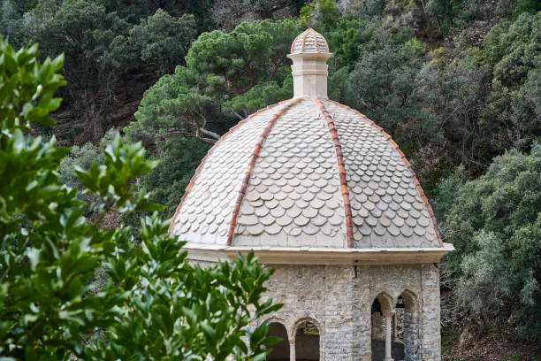Camogli, Italy - April 03, 2022: the dome of Abbey of San Fruttuoso, one-time Benedictine monastery built in the 10th century. It's located on the italian riviera between Camogli and Portofino. The abbey can only be reached by sea or by hiking trails. Camogli. Genova. Italy.