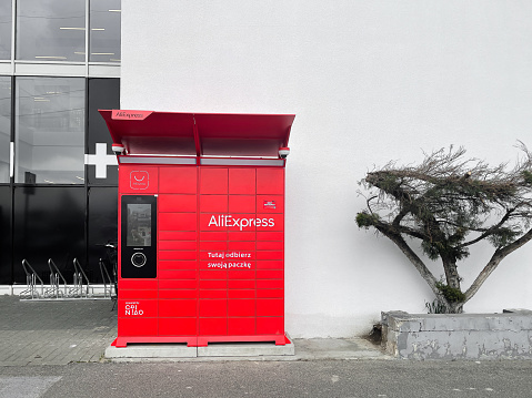 Poznan, Poland - 23 April 2022 Aliexpress automatic self-service delivery locker with parcels form China. High quality photo