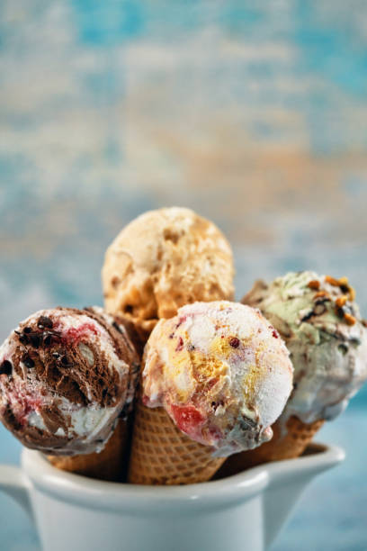istock Pistachio, Chocolate, Strawberry and Vanilla Ice Cream in a Cone 1393649219
