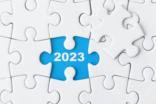 Open white puzzle with the year 2023 stock photo