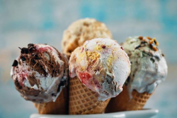 istock Pistachio, Chocolate, Strawberry and Vanilla Ice Cream in a Cone 1393649390