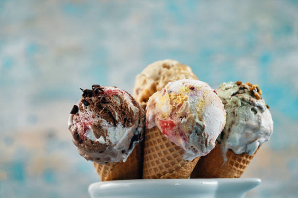 istock Pistachio, Chocolate, Strawberry and Vanilla Ice Cream in a Cone 1393649402