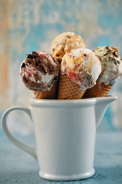 istock Pistachio, Chocolate, Strawberry and Vanilla Ice Cream in a Cone 1393650646