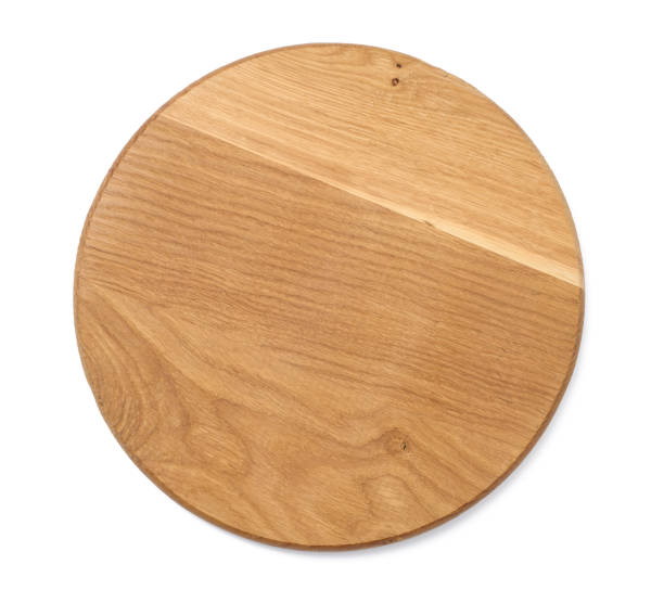 istock Empty round wooden kitchen cutting board, pizza stand. White background 1393651149
