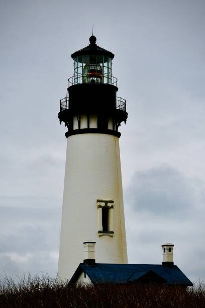 The North Head Lighthouse. Located near Ilwaco, Washington on the Pacific Ocean. Taken from Cape Disappointment State Park where the Columbia River meets the Pacific Ocean. Great looking waves can be seen in the Columbia bar from this park.