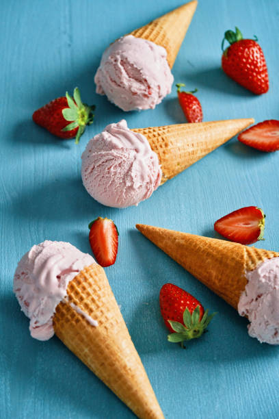 istock Strawberry Ice Cream in a Cone 1393652479