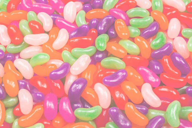 istock Colorful jelly beans isolated on white. 1393654530
