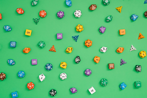 Creative colorful Polyhedral Dices. Used to Play Games, RPG, Chance. Leisure activities, board games concept.