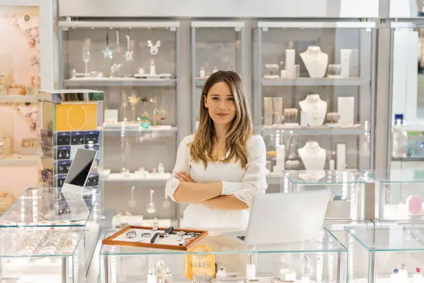 Photo of Young woman running jewelry business