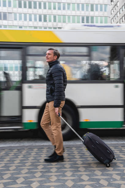 istock Caucasian Man Traveling With Luggage 1393663211