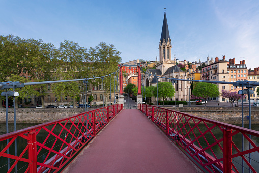 Famous view of red footbridge in Lyon, France