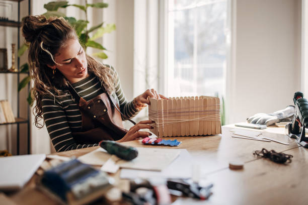 istock Crafty young woman in workshop 1393669196