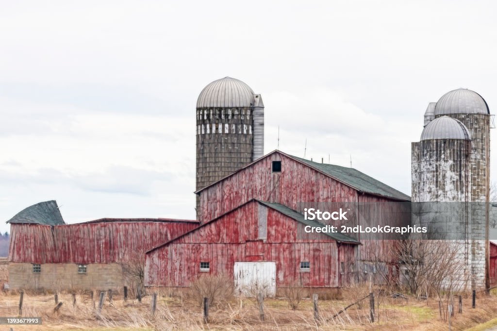 Abandoned Farm Buildings with Copy Space Abandoned Farm  with Copy Space Silo Stock Photo