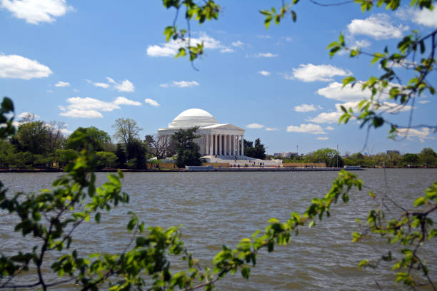 istock White Thomas Jefferson Memorial monument on the Tidal basin with the leaves 1393673448
