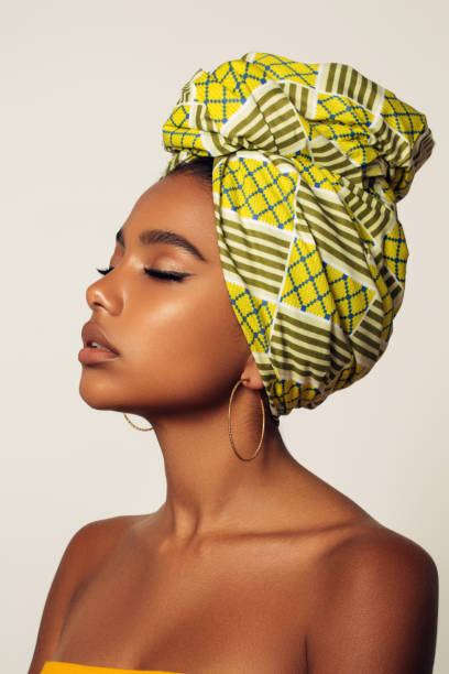 istock African woman with a colorful shawl on her head 1393673965
