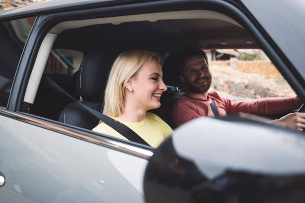 istock Happy couple renting a car 1393674115