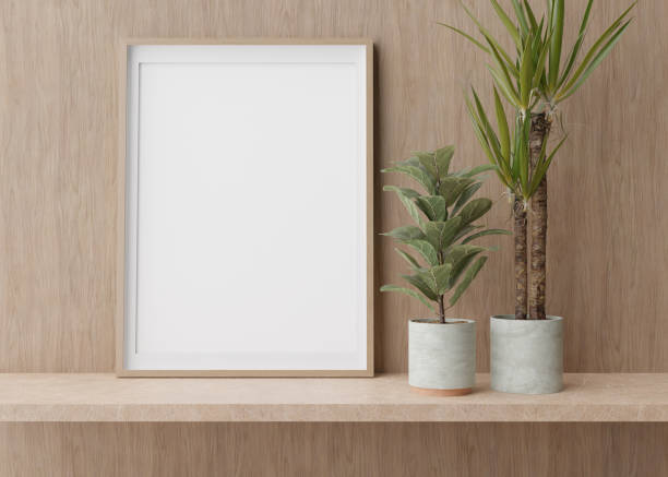 istock Empty vertical picture frame standing on shelve in modern room. Mock up interior in contemporary style. Free, copy space for picture. Plants. 3D rendering. 1393677656