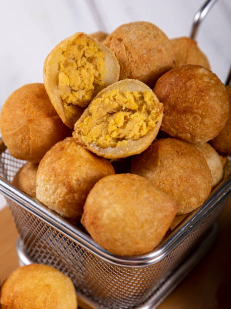 istock Brazilian snacks, fried balls stuffed with chicken 1393687006