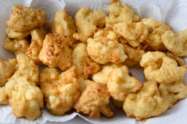 istock fried cauliflower dish in large white plate 1393687180