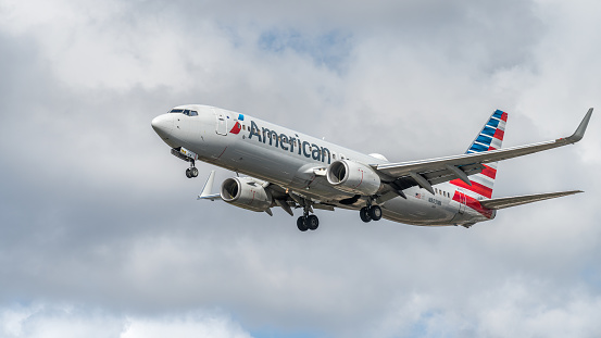 Miami, United States - April 25, 2022: American Airlines airplane (Boeing 737-823) landing at Miami International Airport.