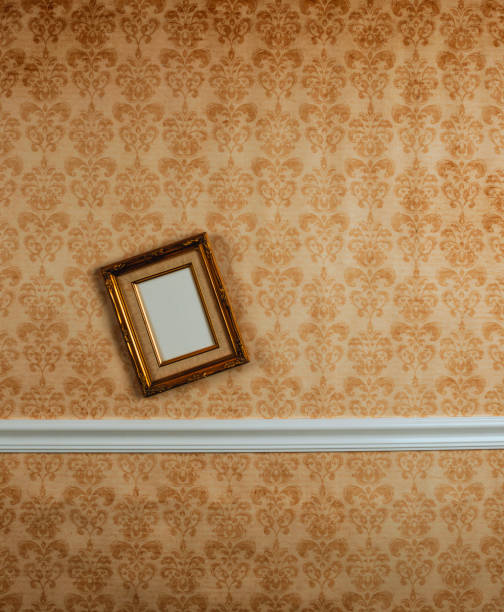 istock A background of an ornate gold empty picture frame on a wall ready for message or graphic 1393696538