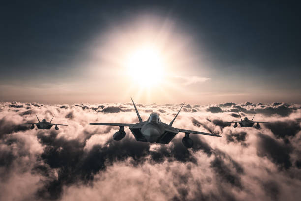 istock Jet fighters flying over the clouds. 1393696747