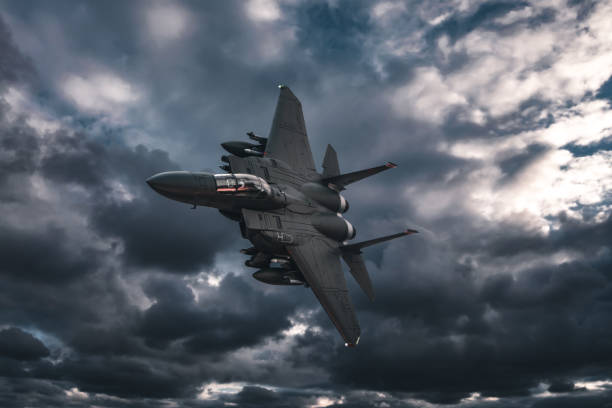 istock Jet fighters flying over the clouds. 1393696858
