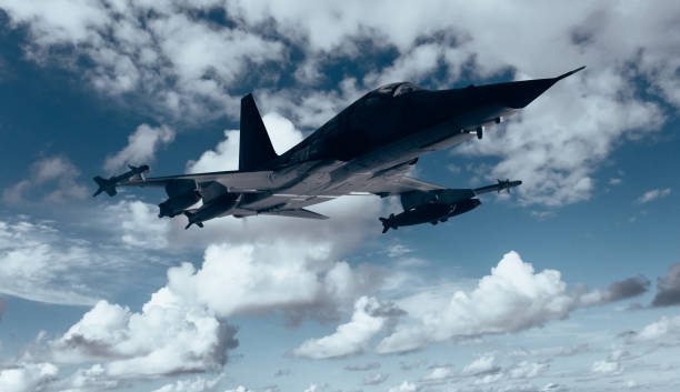 istock Jet fighters flying over the clouds. 1393697616