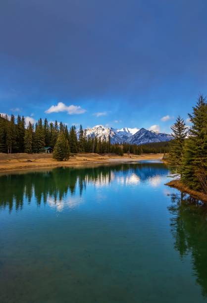 istock Mountain And Sky Reflections On A Calm Banff Lake 1393708447