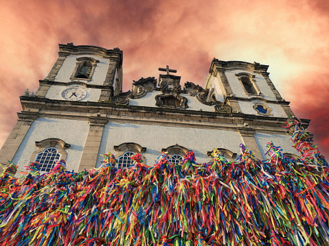 Bonfim Church facade with colored ribbons on the grid
