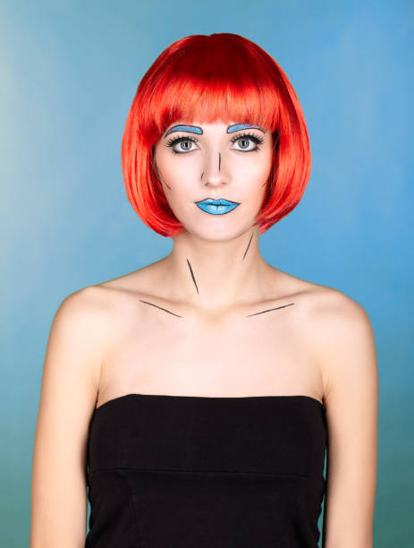 istock Female in red wig and in comic  pop art make-up style on blue background 1393714582