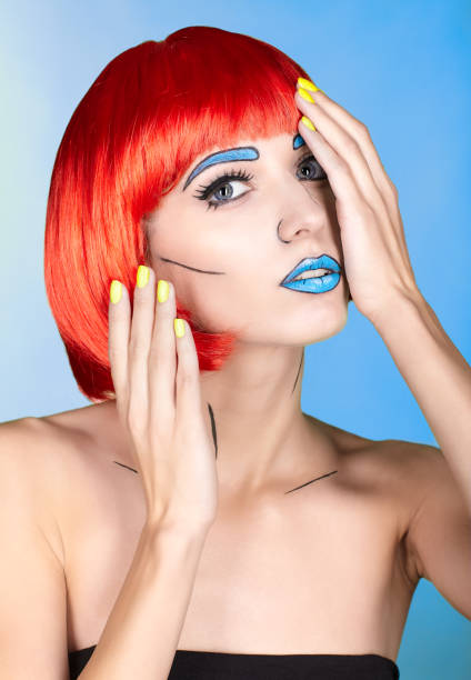 istock Female in red wig and in comic  pop art make-up style on blue background 1393714590