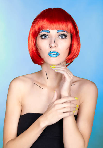 istock Female in red wig and in comic  pop art make-up style on blue background 1393714592