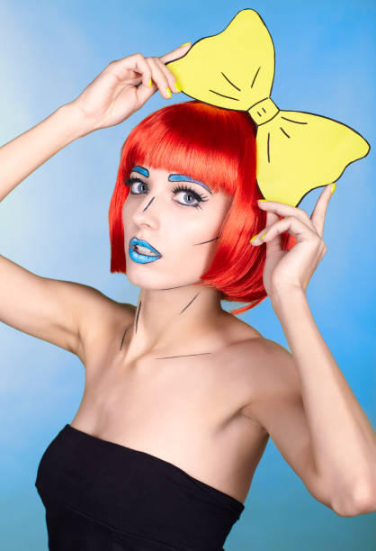 istock Female in red wig and in comic pop art make-up style on blue background 1393714594