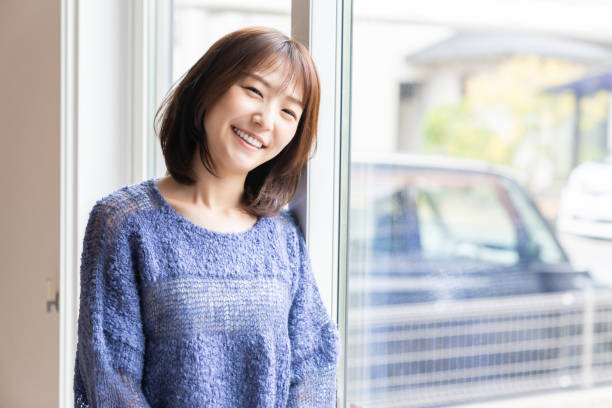 istock attractive asian woman relaxing 1393714649
