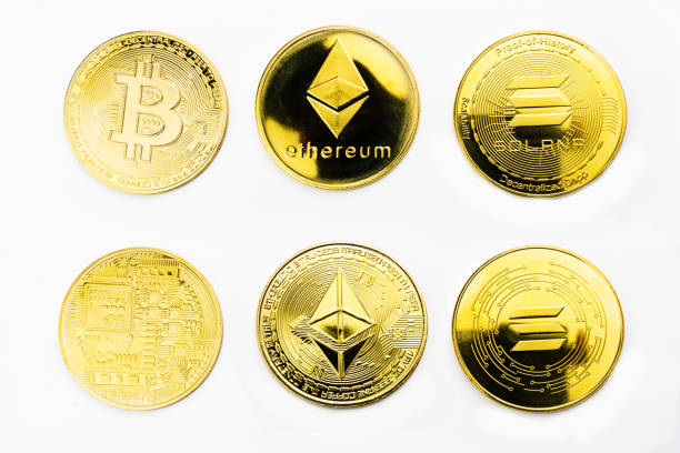 Closeup of a golden Bitcoin, Ethereum and Solana coins with white background. Cryptocurrency coin. Financial market Closeup of a golden Bitcoin, Ethereum and Solana coins with white background. Cryptocurrency coin. Financial market. ethereum stock pictures, royalty-free photos & images