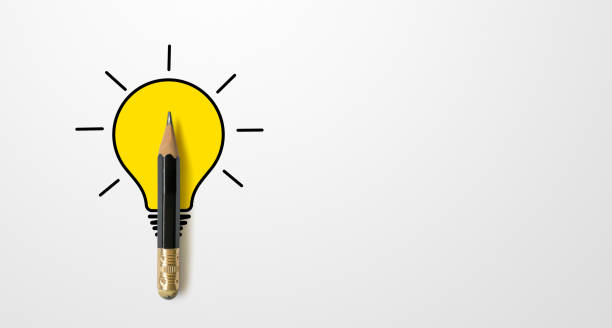 istock Black colour pencil with outline light bulb and word idea on white paper background. Creativity inspiration ideas concept 1393723711